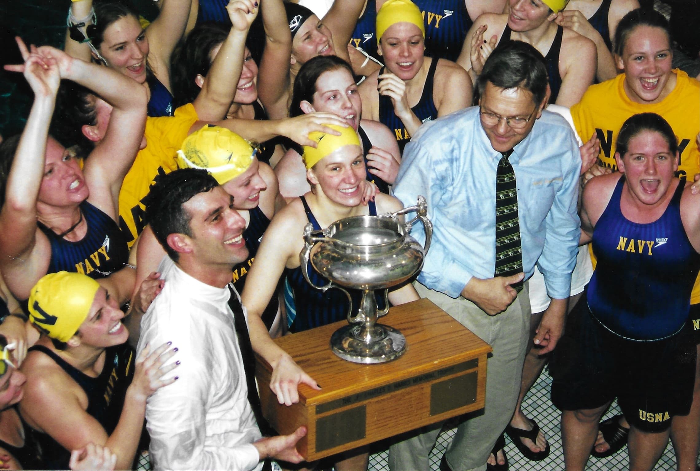 Erin Emery celebrating at a Navy swimming competition